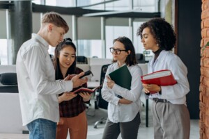 A group discussing their Team Roles at Work